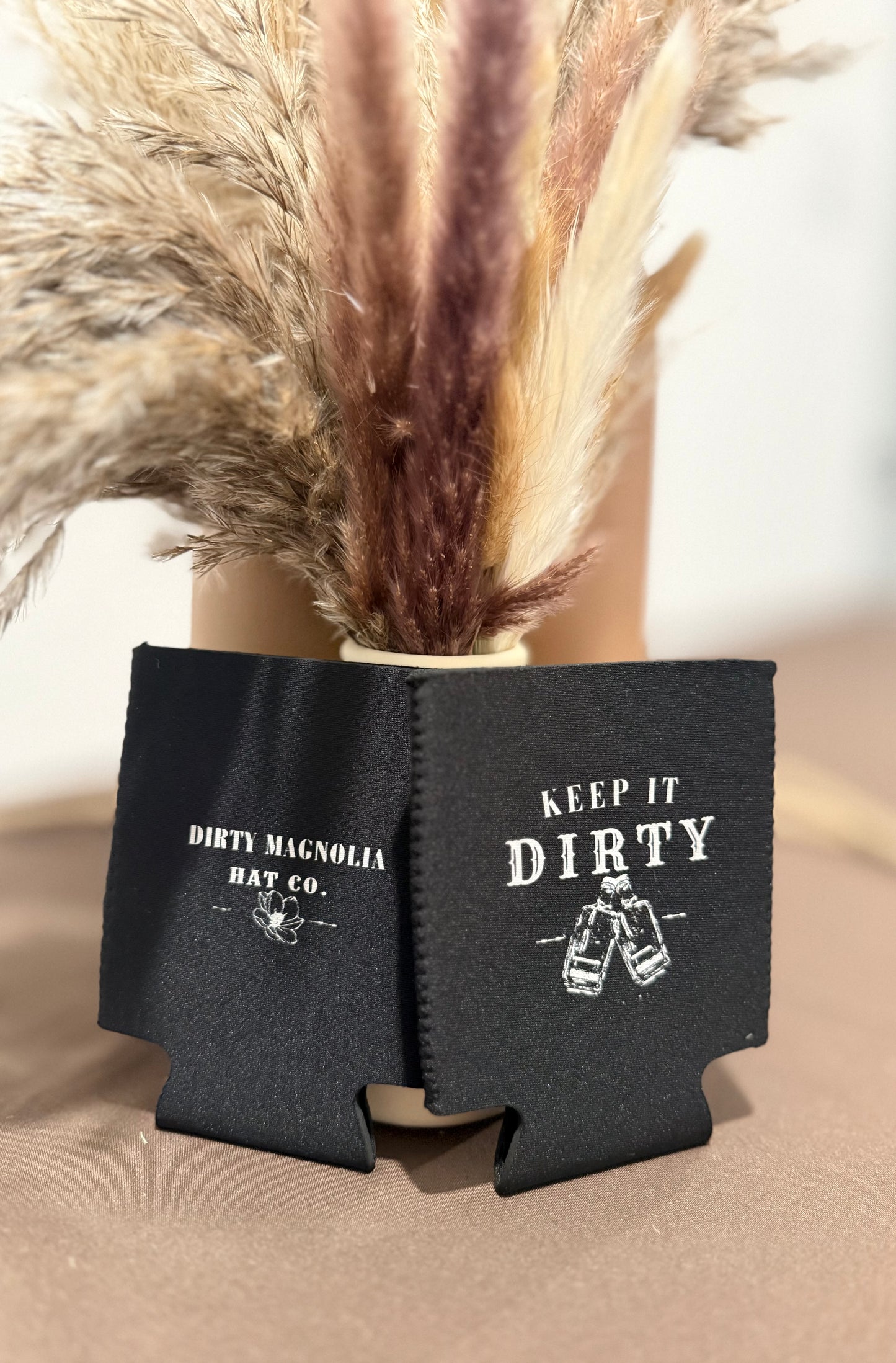 Magnolia’s Top Shelf Black Koozie